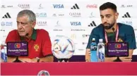  ?? (Reuters) ?? Portugal’s coach Fernando Santos (left) and Portugal’s midfielder Bruno Fernandes at a press conference at the Qatar National Convention Centre in Doha yesterday.