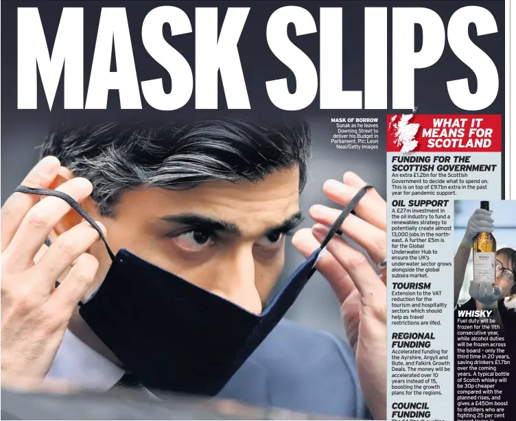  ??  ?? MASK OF BORROW Sunak as he leaves Downing Street to deliver his Budget in Parliament. Pic: Leon Neal/Getty Images