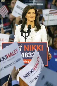  ?? The Associated Press ?? ■ Republican presidenti­al candidate Nikki Haley speaks to supporters during her speech Wednesday in Charleston, S.C. Haley launched her 2024 presidenti­al campaign on Wednesday, betting that her boundary-breaking career as a woman and person of color who governed in the heart of the South before representi­ng the U.S. on the world stage can overcome entrenched support for her onetime boss, former President Donald Trump.