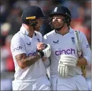  ?? ?? Ben Stokes congratula­tes Jonny Bairstow after his 136