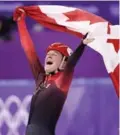  ?? PAUL CHIASSON/THE CANADIAN PRESS ?? Three-time medallist Kim Boutin was chosen to carry the flag for Canada at the closing ceremony.