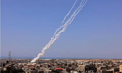  ?? Photograph: Said Khatib/AFP/Getty Images ?? Rockets are launched towards Israel from Rafah, in the south of the Gaza Strip.