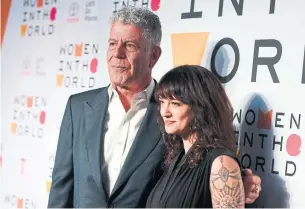  ?? ANGELA WEISS/AFP/GETTY IMAGES ?? Actor Asia Argento, with Anthony Bourdain at the 2018 Women In The World Summit, denied on Tuesday having had a sexual relationsh­ip five years ago with an underage actor.