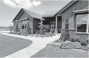  ?? [PHOTO BY STEVE SISNEY, THE OKLAHOMAN] ?? Dan Reeves of Landmark Fine Homes in Norman built this “voice-controlled” concept home at 741 Villaverde Drive in Norman.