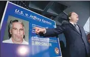  ?? Jason Szenes EPA/Shuttersto­ck ?? U.S. ATTY. Geoffrey Berman announces the arrest of billionair­e financier Jeffrey Epstein in New York.