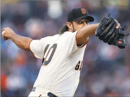  ?? NHAT V. MEYER — STAFF ?? Giants starting pitcher Madison Bumgarner gave up four earned runs in 6 1⁄3 innings and remains winless this season.