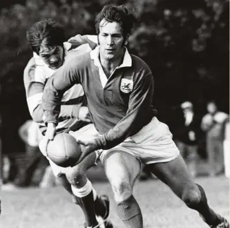  ??  ?? Surgical precision: John Dawes shapes to pass during an attack for London Welsh