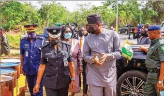  ??  ?? Makinde inspecting the newly-establishe­d Oyo State Security Joint Force Base at Mamu Village on the Oyo/Ogun States border