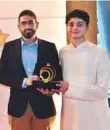  ?? Atiq ur Rehman/Gulf News ?? Abdullah Malek and Ahmad Al Zarouni, whose ‘Pursuit of Happiness’ won the award in the Tolerance and Moderation category.