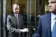  ?? MATT ROURKE — THE ASSOCIATED PRESS ?? Brandon Bostian, left, accompanie­d by his lawyer Brian McMonagle, departs after his preliminar­y hearing at the Criminal Justice Center in Philadelph­ia, Tuesday. A judge has dismissed criminal charges against Bostian, the engineer in an Amtrak...