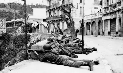  ??  ?? French troops in the Bab-El-Oued district of Algiers in March 1962. Photograph: AP