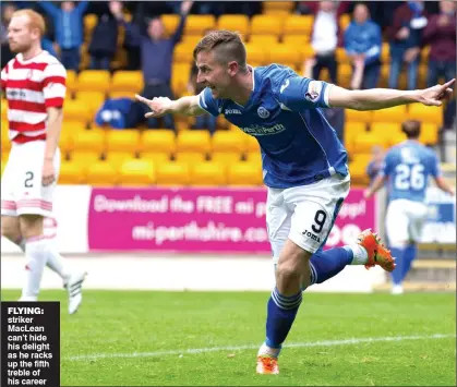  ??  ?? FLYING: striker MacLean can’t hide his delight as he racks up the fifth treble of his career