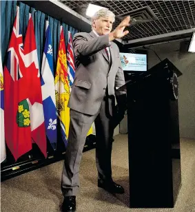  ?? ADRIAN WYLD/THE Canadian Press files ?? Sen. Romeo Dallaire waves as he leaves the podium last month after announcing his plan
to retire from the Senate. He gave his final Senate speech Wednesday.