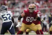  ?? TONY AVELAR — THE ASSOCIATED PRESS FILE ?? San Francisco 49ers offensive tackle Mike McGlinchey (69) blocks against the Seattle Seahawks in Santa Clara on Sunday, Sept. 18.