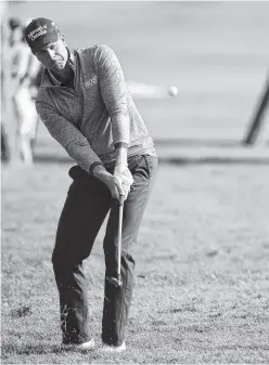  ?? THE ASSOCIATED PRESS ?? Henrik Stenson chips to the 16th green during the second round of the Arnold Palmer Invitation­al on Friday in Orlando, Fla. Stenson is tied for the lead at 11 under par.