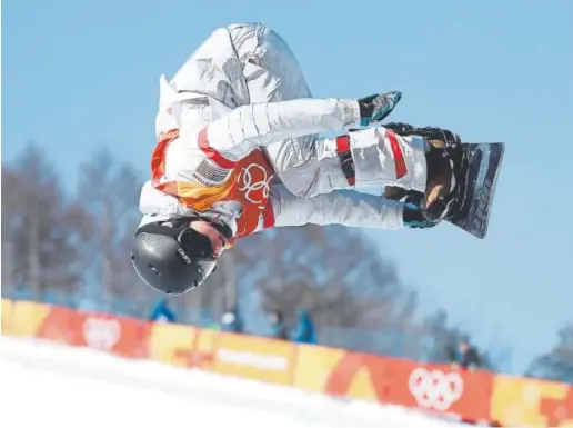  ?? Cameron Spencer, Getty Images ?? American Arielle Gold, delivering her bronze performanc­e in the women’s snowboard halfpipe final Feb. 13 during the Winter Games at Phoenix Snow Park in Pyeongchan­g, says the medal “is more of a validation for myself than for anyone else. I didn’t do...