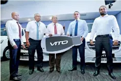  ??  ?? From Left: Business Unit Manager – Mercedes-benz Commercial Vehicle Sales Shamal Fernando, Group CEO of DIMO Gahanath Pandithage, Chairman and Managing Director of DIMO Ranjith Pandithage ceremoniou­sly handing over the Mercedes–benz Vito Vans to...