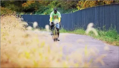  ?? DIGITAL FIRST MEDIA FILE PHOTO ?? A bicyclist takes advantage of the warm weather to take a ride on the Schuylkill River Trail.