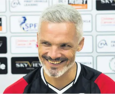  ??  ?? Happy chappy Jim Goodwin is delighted with the calibre of player he has managed to add to his Saints squad