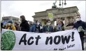  ?? MICHAEL SOHN — THE ASSOCIATED PRESS ?? A climate protest takes place in Berlin, Germany, on Friday.