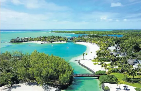  ??  ?? VERY VIP: The five-star resort, above, occupies a spectacula­r location on the Mauritian east coast. Top right is a peek inside a Hibiscus junior suite with beach access