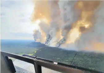  ?? B.C. WILDFIRE SERVICE VIA THE CANADIAN PRESS ?? The growing Donnie Creek Complex fire, north of Fort St. John, that has forced renewed evacuation orders and alerts.