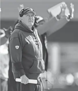  ?? MICHAEL DWYER/AP ?? Patriots head coach Bill Belichick looks toward the scoreboard during the first half against the Bills on Oct. 22 in Foxborough, Mass.