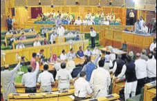  ?? PTI ?? National Conference and Congress MLAs shout slogans to protest against GST bill in Srinagar on Wednesday.