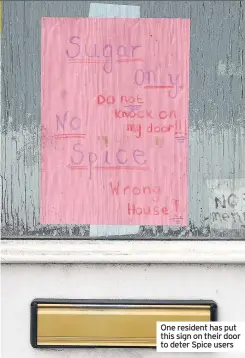  ??  ?? One resident has put this sign on their door to deter Spice users