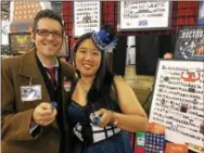  ?? ERIC DEVLIN — DIGITAL FIRST MEDIA ?? Nathan Skreslet and Ly Cao, selling products from their “Doctor Who”-inspired art project “Pixel Who,” during Wizard World Comic Con in Philadelph­ia Saturday.