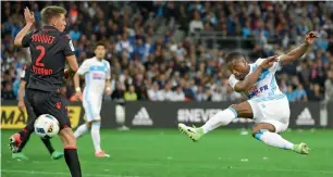  ?? AFP ?? Marseille’s Patrice Evra (right) vies for the ball with Nice’s Arnaud Souquet. —