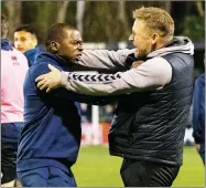  ?? PICTURE: Glenn Alcock ?? GRITTED TEETH: North Leigh boss Eddie Odhiambo, left, leads the celebratio­ns