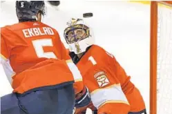  ?? JIM RASSOL/STAFF PHOTOGRAPH­ER ?? Goalie Roberto Luongo, who was solid in goal in his first start at home in a while, keeps his eye on the puck on this first period play Thursday night.