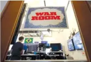  ?? AP PHOTO/JEFF CHIU ?? A man works at his desk Wednesday in the war room, where Facebook monitors election related content on the platform, in Menlo Park, Calif.