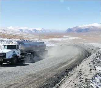  ?? FILES VYACHESLAV OSELEDKO/AFP/GETTYIMAGE­S ?? A truck moves along a road near Centerra’s Kumtor gold mine, which was the target of London-listed Chaarat’s takeover bid that Centerra had rejected in April. The Toronto-based gold company is also stuck in conflicts with Kyrgyz authoritie­s related to...