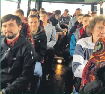  ?? Photograph: Alastair Dobson. ?? Excitement is in the air as Arran AFC travel to the game in the team bus.