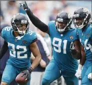  ?? Michael Reaves
Getty Images ?? /
The Jacksonvil­le Jaguars lined up eight interviews for their head coaching vacancy Tuesday, including five coordinato­rs who are headed to the playoffs.