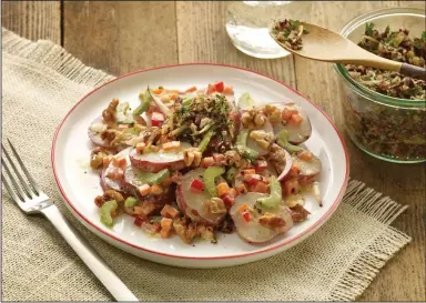  ?? (Courtesy of California Walnuts) ?? Herbed Walnut Potato Salad