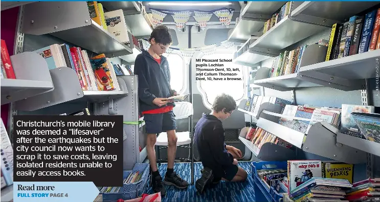  ??  ?? Mt Pleasant School pupils Lochlan Thomson-Dent, 10, left, and Callum ThomsonDen­t, 10, have a browse.