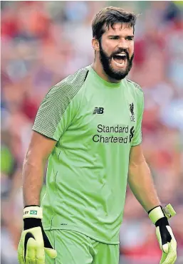  ?? Picture: Getty. ?? Liverpool goalkeeper Alisson Becker has played a key role for the Anfield club since joining from Roma in a £65 million deal last summer.