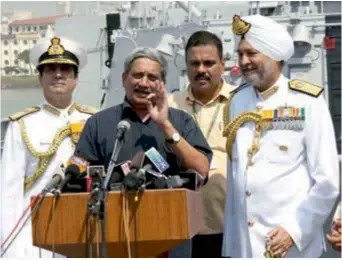  ??  ?? Defence Minister Manohar Parrikar, seen with Admiral Robin Dhowan, CNS and Vice Admiral SPS
Cheema, FOC-in-C Western Naval Command at the commission­ing of INS Kochi