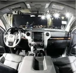  ?? Charles Rex Arbogast / Associated Press ?? The interior of the redesigned 2014 Toyota Tundra features more luxurious offerings, such as a blind spot monitor and standard backup camera.