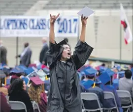  ?? Allen J. Schaben Los Angeles Times ?? DARRYLL MERCADEL, 18, celebrates his graduation in June. L.A. Unified’s multimilli­on-dollar efforts to raise graduation rates have drawn some criticism.