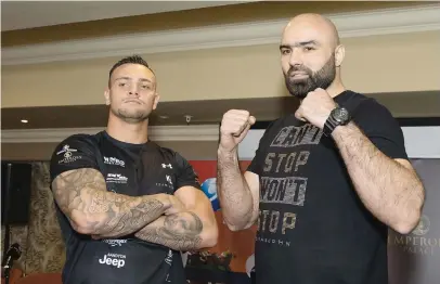  ?? Picture: James Gradidge/Gallo Images ?? BIG BUSINESS. Kevin Lerena (left) and his opponent Bogdan Dinu during the ‘Heavyweigh­t Mania’ boxing tournament pre-fight medical and weigh-in at Emperors Palace.