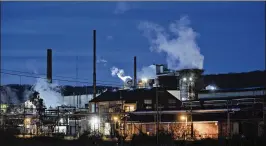  ?? ANDREW HARRER / BLOOMBERG ?? Emissions rise from the U.S. Steel Corp. Clairton Plant coke manufactur­ing in Clairton, Pa. U.S. Steel shares are down 36 percent since March 1, the worst performanc­e in the S&amp;P steelmaker­s index.