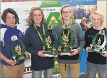  ?? Pictures: PAUL CARRACHER ?? YOUNG TALENT: Harry Miller and Cody Helyar, centre, won Horsham District league’s under-14 football best-and-fairest award from Tyler Hateley, left, and Riley Hall.