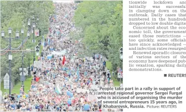  ?? Picture: REUTERS ?? People take part in a rally in support of arrested regional governor Sergei Furgal who is accused of organising the murder of several entreprene­urs 15 years ago, in Khabarovsk, Russia.