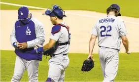  ?? TONY GUTIERREZ AP ?? Dodgers starting pitcher Clayton Kershaw (22) leaves Game 4 of the NLCS in the sixth inning. The number of pitching changes in today’s game is killing its pace.