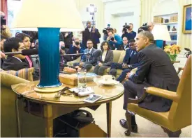  ?? (AP FOTO) ?? MORE TIME. In this Feb. 4, 2015 file photo, President Barack Obama meets with a group of “Dreamers” in the Oval Office of the White House in Washington. A federal judge temporaril­y blocked Obama’s executive action on immigratio­n on Monday, giving a...