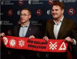  ?? BARRY CHIN/GLOBE STAFF ?? Caleb Porter (left, with Revolution sporting director Kurt Onalfo) is seeking a third MLS Cup with a third organizati­on.